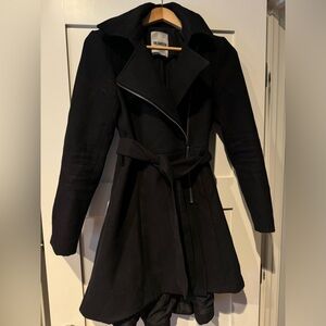 Black wool jacket with asymmetric zipper with long er draped back detail